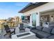 Inviting balcony featuring outdoor seating, dining, and a view of the ocean and outdoor kitchen at 6480 S Atlantic Ave, New Smyrna Beach, FL 32169