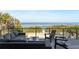 This outdoor deck showcases lounge seating with panoramic ocean views, perfect for relaxation at 6480 S Atlantic Ave, New Smyrna Beach, FL 32169