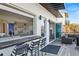 Exterior view of the bar, offering an open indoor/outdoor layout for seamless entertaining at 6480 S Atlantic Ave, New Smyrna Beach, FL 32169