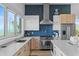 This bright kitchen features modern appliances, sleek countertops, and ocean views at 6480 S Atlantic Ave, New Smyrna Beach, FL 32169