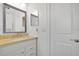Bathroom with a mirror and a vanity at 6735 Edgeworth Dr, Orlando, FL 32819