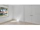 Bedroom featuring a large window and closet space at 6735 Edgeworth Dr, Orlando, FL 32819