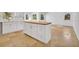 Kitchen island with drawers and cabinets, paired with an eat-in kitchen space at 6735 Edgeworth Dr, Orlando, FL 32819