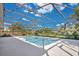 Inviting pool with screened enclosure and beautiful backyard views at 6735 Edgeworth Dr, Orlando, FL 32819
