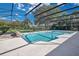 Sparkling pool surrounded by a screened enclosure, offering a private oasis at 6735 Edgeworth Dr, Orlando, FL 32819