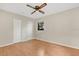 Spacious bedroom with a ceiling fan, natural light, and closet at 7121 Stockholm Way, Orlando, FL 32822