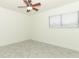 Bedroom featuring neutral walls, window with blinds and ceiling fan at 7536 Fenwick Cove Ln, Orlando, FL 32819