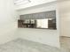 Open dining room with a pass-through to the kitchen, providing a seamless flow for entertaining and Gathering gatherings at 7536 Fenwick Cove Ln, Orlando, FL 32819