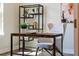 Bright home office area boasting stylish decor, natural light and wood look flooring at 7916 Wandering Way, Orlando, FL 32836
