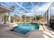 Inviting pool featuring a screened-in enclosure, creating a private and serene outdoor living space at 8661 Crestgate Cir, Orlando, FL 32819