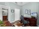 Bright home office features a desk, chair and closet for storage at 9228 Cardinal Meadow Trl, Orlando, FL 32827