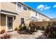 Charming brick patio with stylish outdoor seating and lush landscaping for relaxing and entertaining at 9228 Cardinal Meadow Trl, Orlando, FL 32827