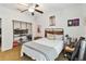 Bedroom features ceiling fan and closet storage at 9686 Cypress Pine St, Orlando, FL 32827