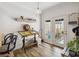 Bright and airy kitchen nook with outdoor access and a versatile workspace at 9686 Cypress Pine St, Orlando, FL 32827