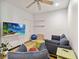 Cozy living room featuring new hardwood flooring and fresh paint at 9686 Cypress Pine St, Orlando, FL 32827
