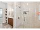 Bathroom featuring a subway tile shower with seamless glass door at 9686 Cypress Pine St, Orlando, FL 32827