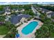 Aerial view of community pool and clubhouse at 9916 Sweepstakes Ln # 1, Orlando, FL 32837