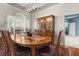 Elegant dining room featuring hardwood floors, and a decorative light fixture at 12018 Radbourne St, Winter Garden, FL 34787