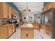 Spacious kitchen with granite countertops, stainless steel appliances, and ample cabinet space at 12018 Radbourne St, Winter Garden, FL 34787