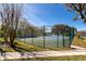 Enjoy a game on this well-maintained community tennis court with stunning views at 12018 Radbourne St, Winter Garden, FL 34787