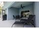 Covered outdoor patio with outdoor furniture, ceiling fan, and a barbecue grill at 127 Thorne Meadow Pass, Davenport, FL 33897