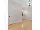 Bedroom featuring hardwood floors, plantation shutters, neutral tones, and a chandelier at 12848 Jacob Grace Ct, Windermere, FL 34786