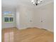 Light-filled bedroom with hardwood floors and window for a bright, airy feel at 12848 Jacob Grace Ct, Windermere, FL 34786