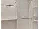 Well-organized walk-in closet with adjustable shelves and ample storage space at 12848 Jacob Grace Ct, Windermere, FL 34786