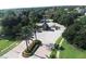 Aerial view of the community entrance with lush landscaping and a secure gate at 12848 Jacob Grace Ct, Windermere, FL 34786