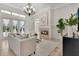 Inviting living room with fireplace, French doors, and natural light at 12848 Jacob Grace Ct, Windermere, FL 34786