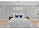 Relaxing bedroom showcasing a plush bed and neutral decor at 12848 Jacob Grace Ct, Windermere, FL 34786