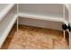 Spacious walk-in closet with built-in shelving and tile flooring at 12848 Jacob Grace Ct, Windermere, FL 34786