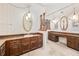Bathroom with dual vanities and make-up vanity at 1321 Medinah Ct, Winter Park, FL 32792