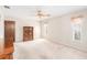 Bedroom featuring a ceiling fan, carpet, and wood furniture at 1321 Medinah Ct, Winter Park, FL 32792