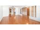 Open living space featuring hardwood floors and seamless flow into other rooms at 1321 Medinah Ct, Winter Park, FL 32792