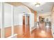 Bright and airy living space with hardwood floors and decorative columns at 1321 Medinah Ct, Winter Park, FL 32792