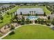 Aerial view of community amenities including a pool, playground, and picnic area at 13727 Bressler Aly, Windermere, FL 34786