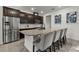 Contemporary kitchen features granite countertops, stainless steel appliances, and ample counter space at 13727 Bressler Aly, Windermere, FL 34786