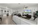 Spacious living room open to the kitchen and dining area, perfect for entertaining at 13727 Bressler Aly, Windermere, FL 34786