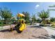 Outdoor playground with slides, climbing structures, and a variety of play equipment at 14225 Southern Red Maple Dr, Orlando, FL 32828