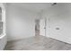 Bedroom with gray flooring, a large window, and a closet at 16659 Sw 21St Avenue Rd, Ocala, FL 34473