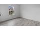 Bedroom with a window and light gray flooring at 16659 Sw 21St Avenue Rd, Ocala, FL 34473