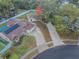 Expansive property featuring a long driveway and a home with solar panels and a pool at 1730 Country Terrace Ln, Apopka, FL 32703