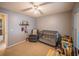 Cozy bedroom features a crib and a comfortable arm chair, perfect for a Bedroom at 1730 Country Terrace Ln, Apopka, FL 32703