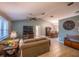 Spacious living room featuring neutral colors, tile floors, and a high ceiling at 1730 Country Terrace Ln, Apopka, FL 32703