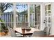Bright dining area with large windows overlooking back yard at 178 W Sabal Palm Pl # 178, Longwood, FL 32779