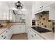Beautiful updated kitchen with white cabinetry, new countertops, and modern appliances at 178 W Sabal Palm Pl # 178, Longwood, FL 32779