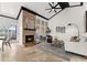 Bright living room with vaulted ceilings, stone fireplace, and lots of natural light at 178 W Sabal Palm Pl # 178, Longwood, FL 32779
