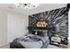 Fun Star Wars themed bedroom featuring an accent wall and coordinated decor at 1959 Branched Oak Rd, St Cloud, FL 34771