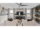Modern living space with neutral tones, sleek furniture, and playful gaming-themed decor at 1959 Branched Oak Rd, St Cloud, FL 34771